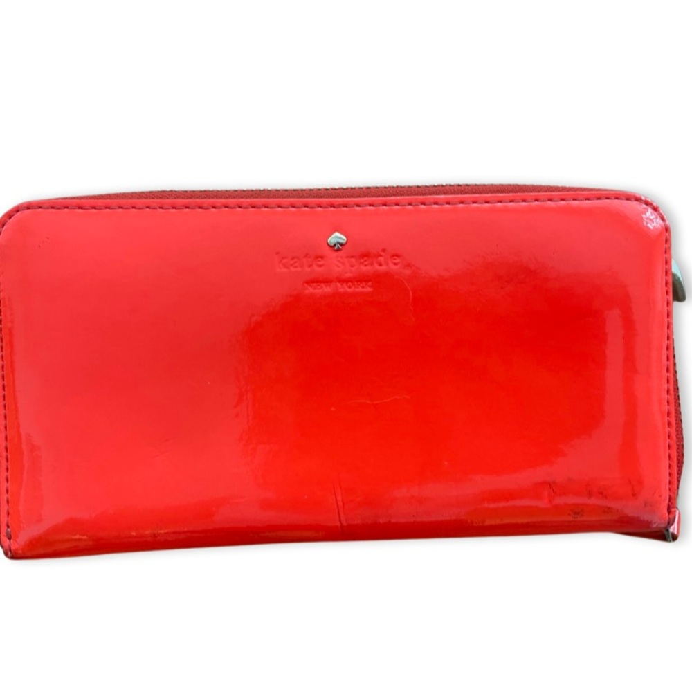 Fun bright orange/red leather Kate Spade zip enclosed wallet